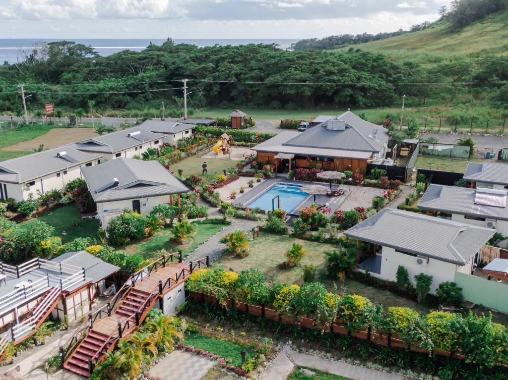 Bulabard Villas — the pool and gardens at golden hour