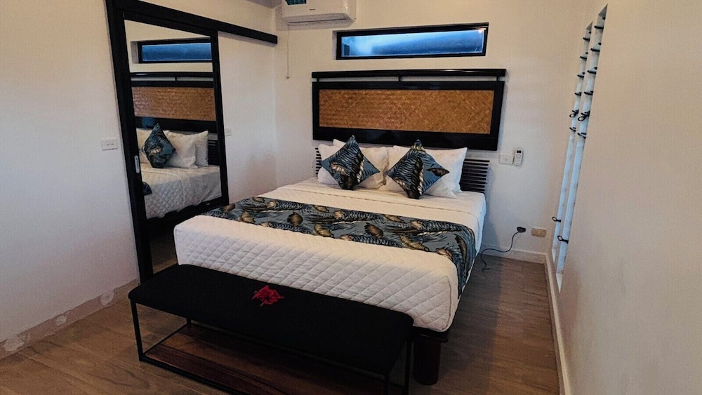 Wicker chairs and a sitting area in the villa