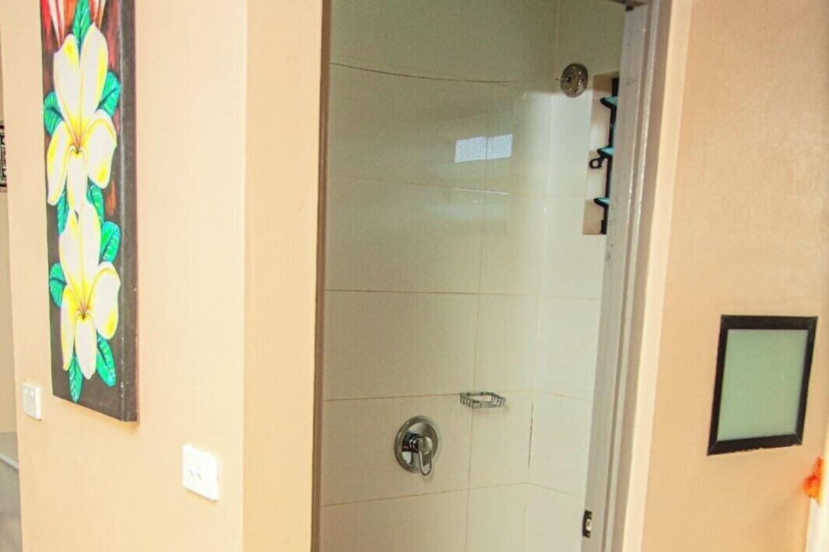 King Family Villa — the private bathroom with shower and amenities